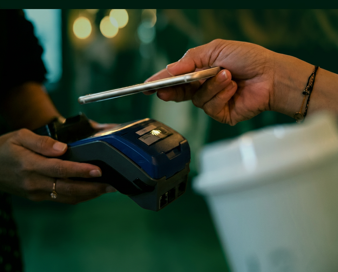 Contactless NFC tap-to-pay on a payment terminal with a smartphone wallet